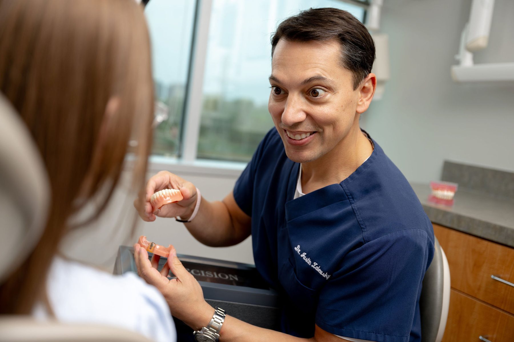 Dr. Zalewsky consulting with a patient