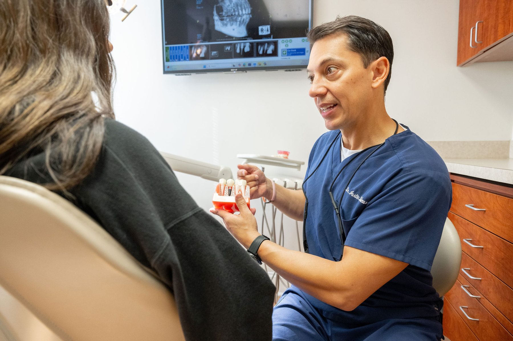 Dr. Zalewsky in patient consultation